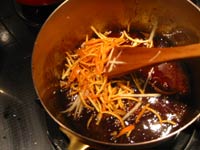 Add the ginger and orange rind.